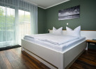 Schlafzimmer zwei mit Terrassen Zugang